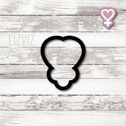 Female Gender Symbol with heart Cookie Cutter. Woman Empowerment.